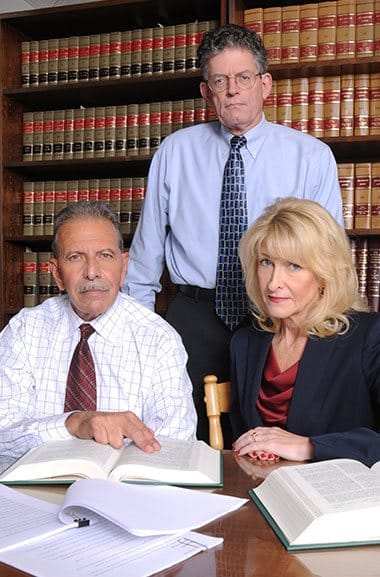 Attorneys Thomas J. Corcoran, Elaine M. Kennedy and Peter M. Solomon
